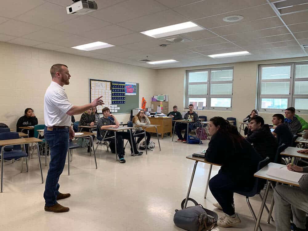 Chamber Member James Killen with Magnus Rewards talks to students at Bullitt Central High School